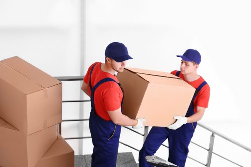 Packed boxes and furniture prepared for a house move in Blackfen