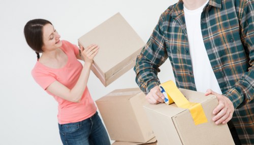 House movers assisting a family relocation with careful unloading