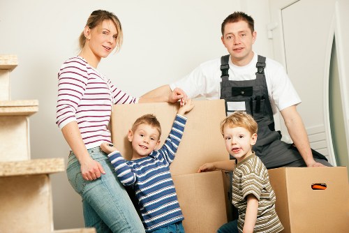 Careful wrapping of fragile household items during a packing service