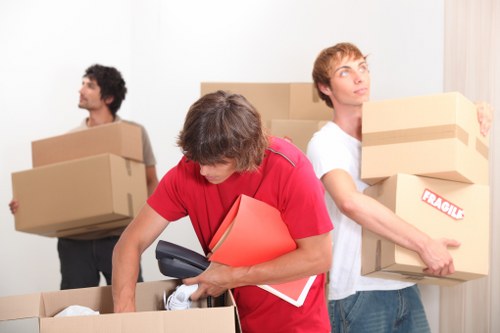 A local removals team loading furniture for a move in Blackfen