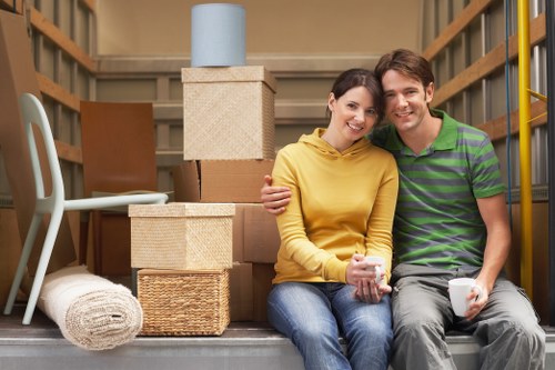 Packed boxes and furniture ready for collection by Blackfen movers