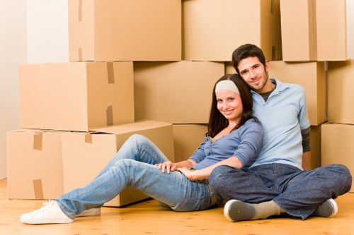 Professional movers loading furniture for a Blackfen home relocation