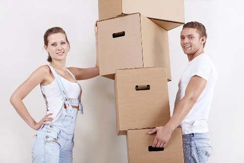 Packed moving boxes and furniture ready for transport