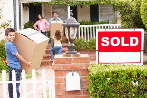 Professional movers handling furniture in Blackfen