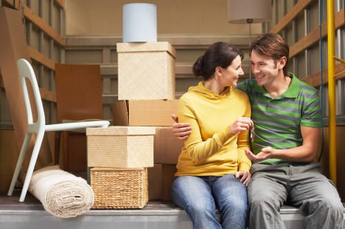 Loading household furniture into a van during a move