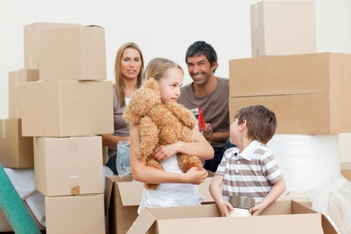 Loading furniture into a removal van in Blackfen