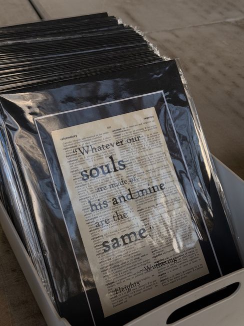 An open book displaying a poem titled 'Internal Bleeding' on a white page, with clean, black text. The poem reads: 'time heals all wounds / is a fallacy, / is only something people say / when the cut